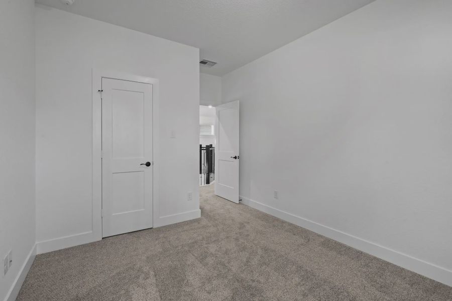 Representative unfurnished interior of a home built from the San Francisco by Chesmar Homes in The Woodlands Hills, Willis (Image 38). Representative unfurnished interior of a home built from the San Francisco by Chesmar Homes in The Woodlands Hills, Willis (Image 38).