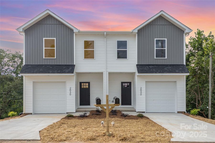 Front exterior of a new home in , Hickory, NC, highlighting curb appeal (Image 22).