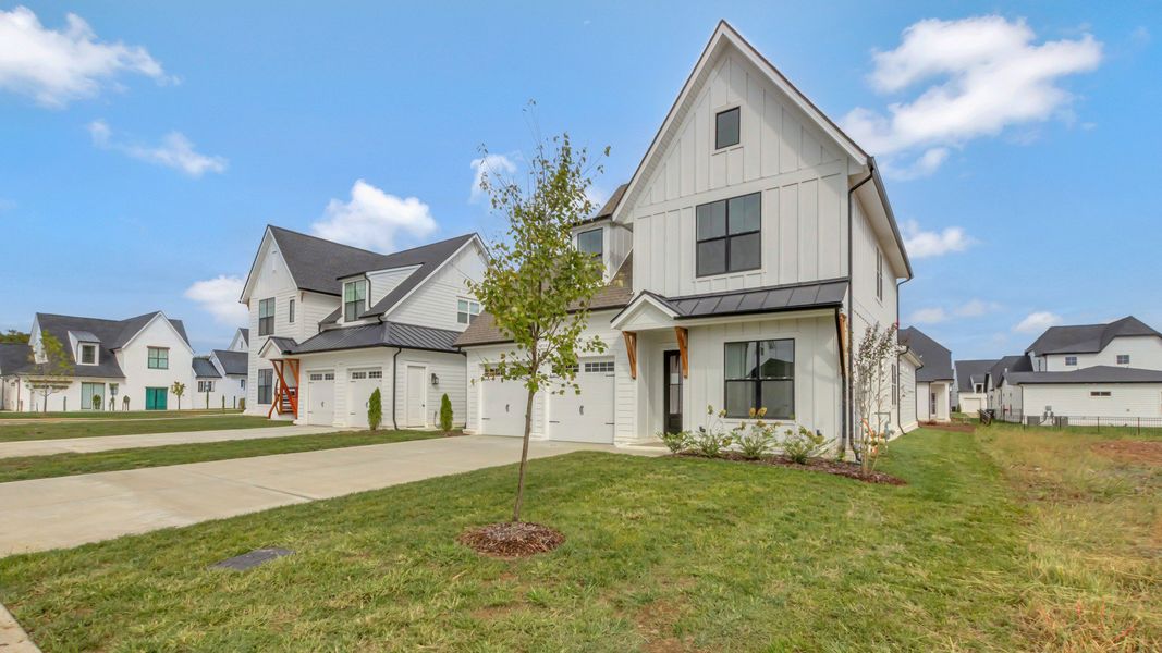 Front exterior of a new home in Shelton Square, Murfreesboro, TN, highlighting curb appeal (Image 22).