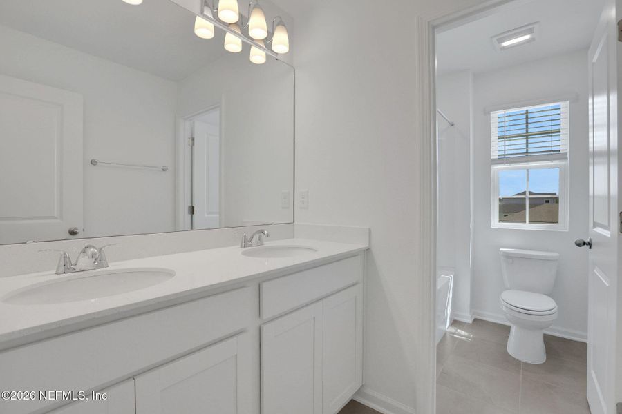 Furnished interior view inside a new home in Amberly, Green Cove Springs (Image 15).