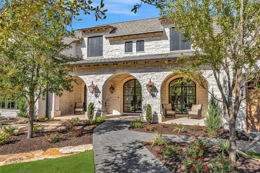 Front exterior of a new home in , Austin, TX, highlighting curb appeal (Image 1). Front exterior of a new home in , Austin, TX, highlighting curb appeal (Image 1).