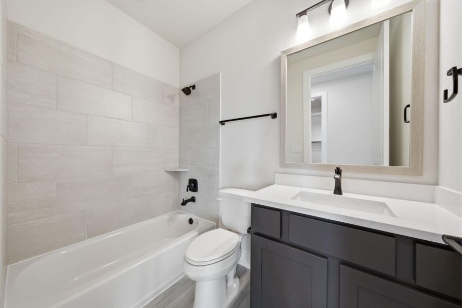 Furnished interior view inside a new home in Chambers Creek, Willis (Image 12).