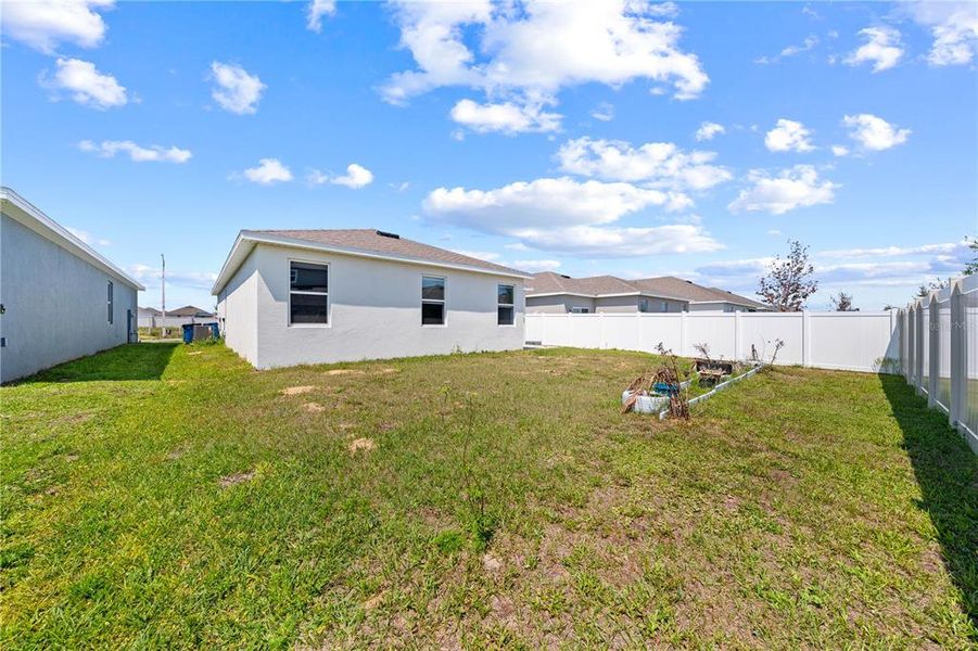 Exterior details and patio area of a home in Cypress Park Estates, Haines City (Image 21).