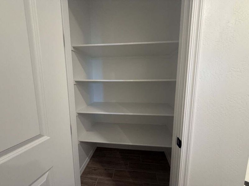 Linen closet in primary bathroom