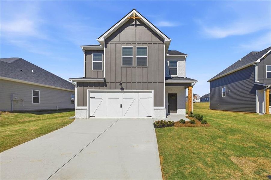 Front exterior of a new home in Preserve at AG Village, Perry, GA, highlighting curb appeal (Image 19). Front exterior of a new home in Preserve at AG Village, Perry, GA, highlighting curb appeal (Image 19).