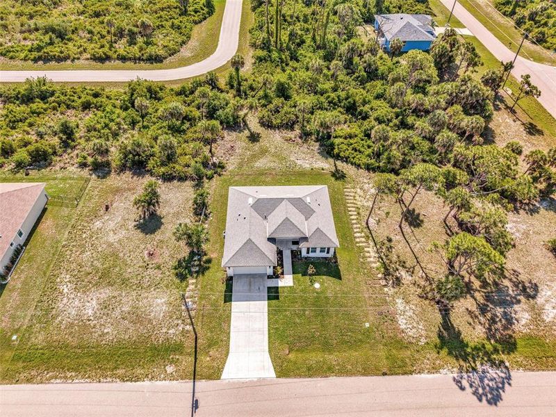 Front exterior of a new home in , Placida, FL, highlighting curb appeal (Image 28).