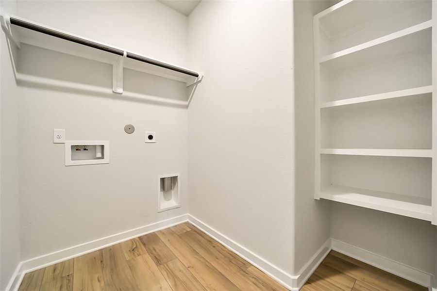 Spacious, unfurnished interior of a new home in Sunterra, Katy (Image 48).