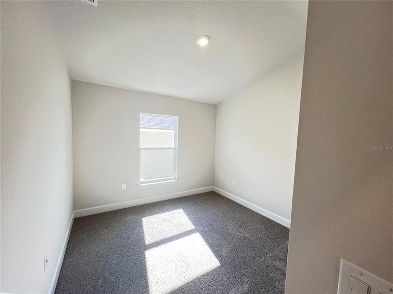 Spacious, unfurnished interior of a new home in Abbey Glen, Dade City (Image 13).