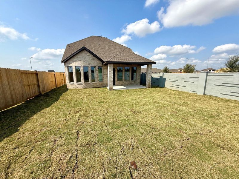 Front exterior of a new home in Jubilee 40', Hockley, TX, highlighting curb appeal (Image 2). Front exterior of a new home in Jubilee 40', Hockley, TX, highlighting curb appeal (Image 2).