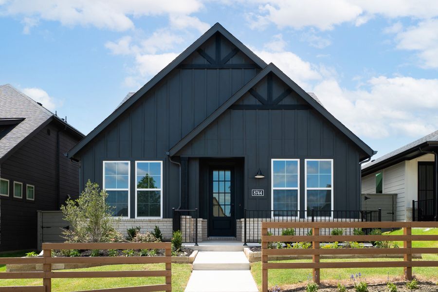 Front exterior of a new home in Treeline, Justin, TX, highlighting curb appeal (Image 1). Front exterior of a new home in Treeline, Justin, TX, highlighting curb appeal (Image 1).