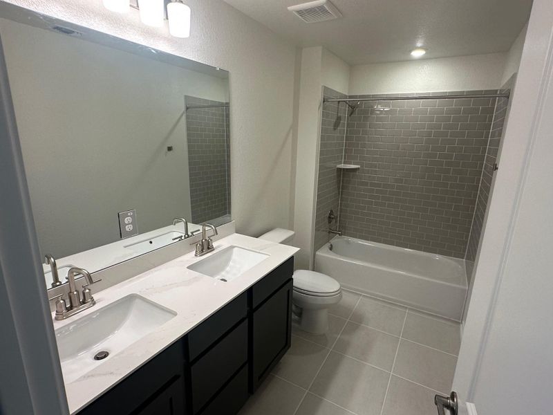 Furnished interior view inside a new home in Salerno - Classic Collection, Round Rock (Image 5).