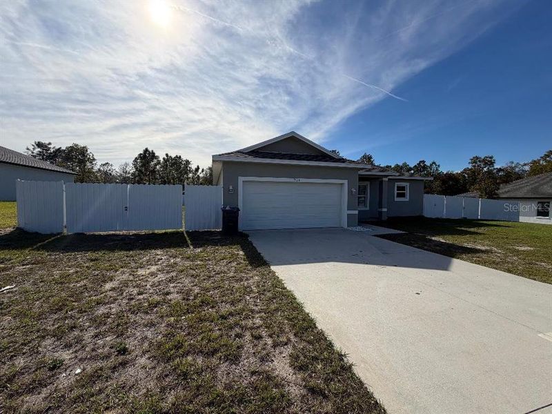 Front exterior of a new home in , Ocala, FL, highlighting curb appeal (Image 2).