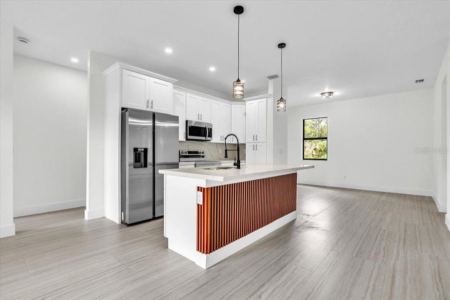 Furnished interior view inside a new home in , Port Charlotte (Image 7).