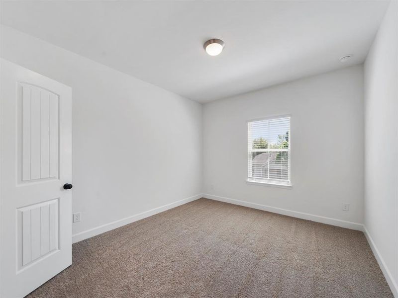 Another view of the third secondary bedroom! (Sample photos of a completed Warwick floor plan. The image may feature alternative selections and/or upgrades.)