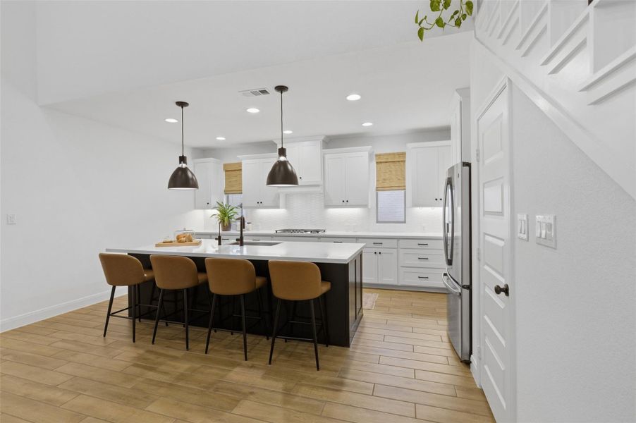 Furnished interior view inside a new home in Wolf Ranch, Georgetown (Image 13).