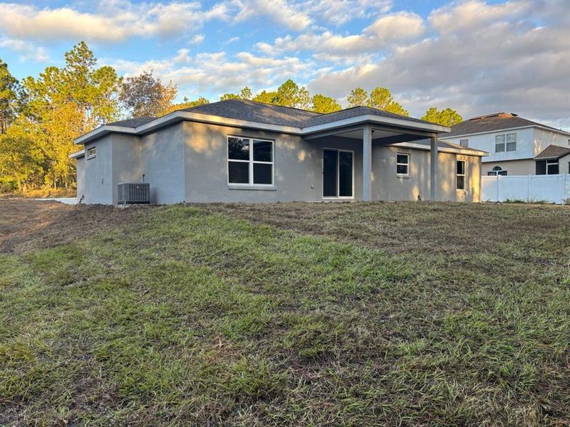 Exterior details and patio area of a home in , Citrus Springs (Image 22).