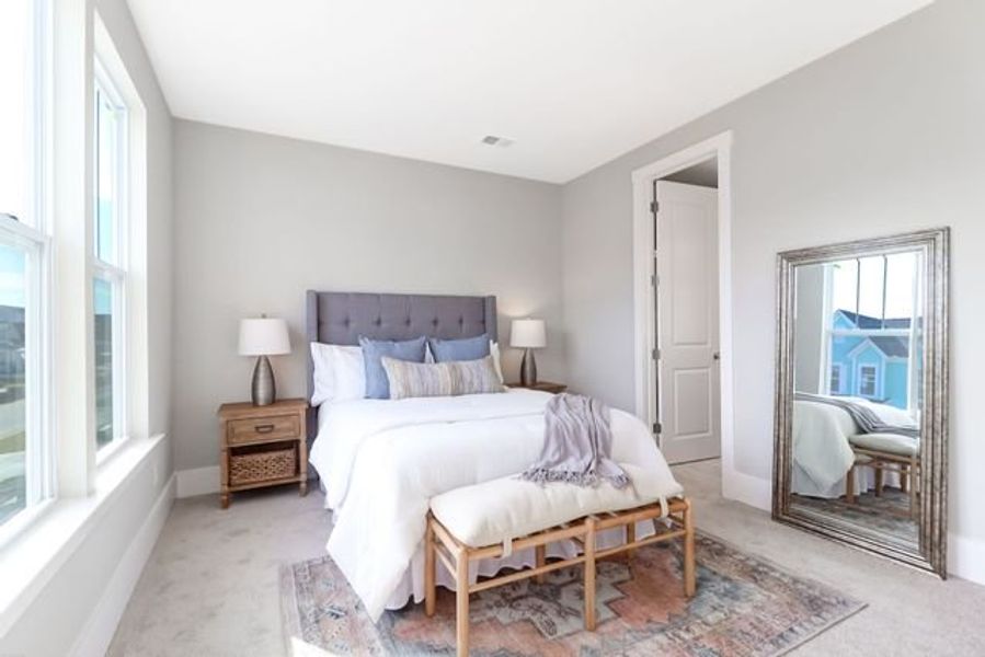 Representative furnished interior of a home built from the Inverness P by True Homes in Homecoming, Ravenel (Image 13).