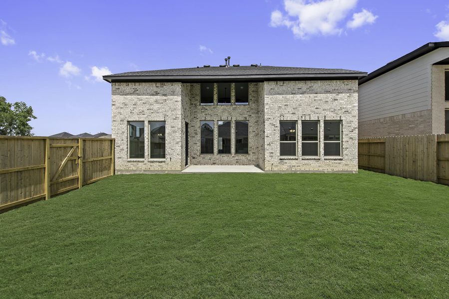 Exterior details and patio area of a home in The Trails, New Caney (Image 3).