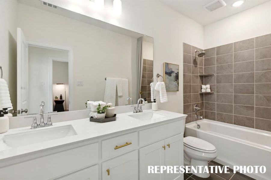 Friends and family will feel right at home in this lovely guest bath.  REPRESENTATIVE PHOTO