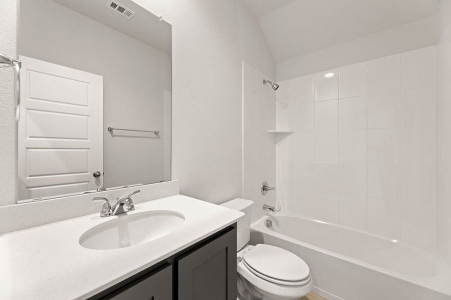 Representative exterior photo of a completed home built from the Canterbury by Impression Homes in Mercer Meadows, Royse City, TX (Image 22). Representative exterior photo of a completed home built from the Canterbury by Impression Homes in Mercer Meadows, Royse City, TX (Image 22).