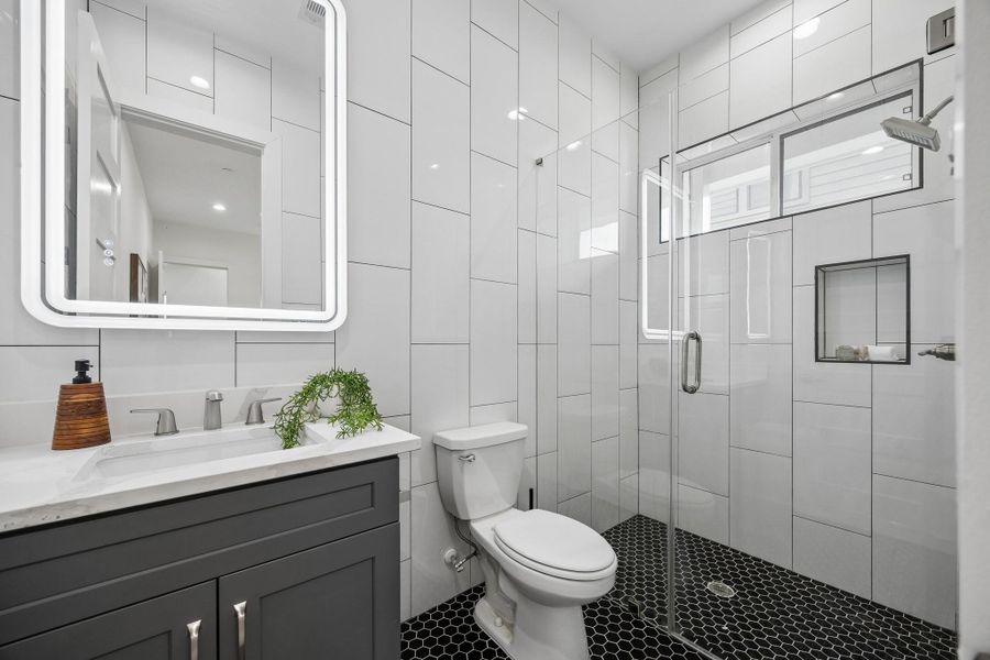 The bath on the first floor has a huge and easily accessible shower. The bath on the first floor has a huge and easily accessible shower.