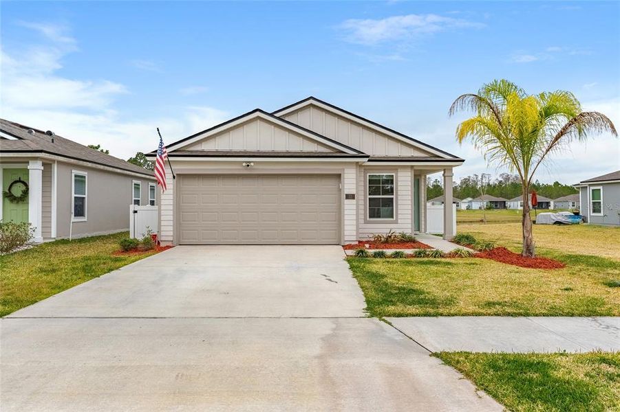 Front exterior of a new home in , Bunnell, FL, highlighting curb appeal (Image 23).