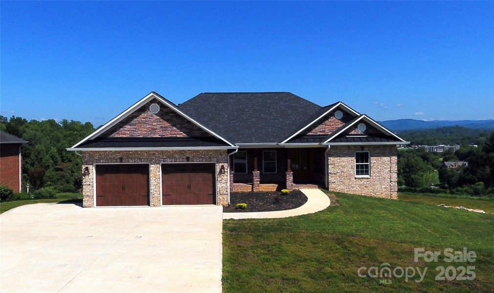 Front exterior of a new home in , Lenoir, NC, highlighting curb appeal (Image 1).
