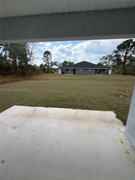 Exterior details and patio area of a home in , Sebring (Image 3).