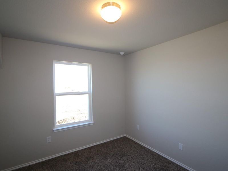 Spacious, unfurnished interior of a new home in Cascades at Onion Creek, Austin (Image 9).