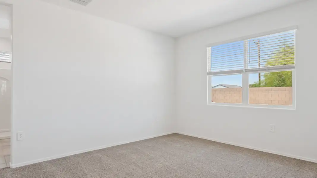 Spacious, unfurnished interior of a new home in Heartland Ranch, Coolidge (Image 13).