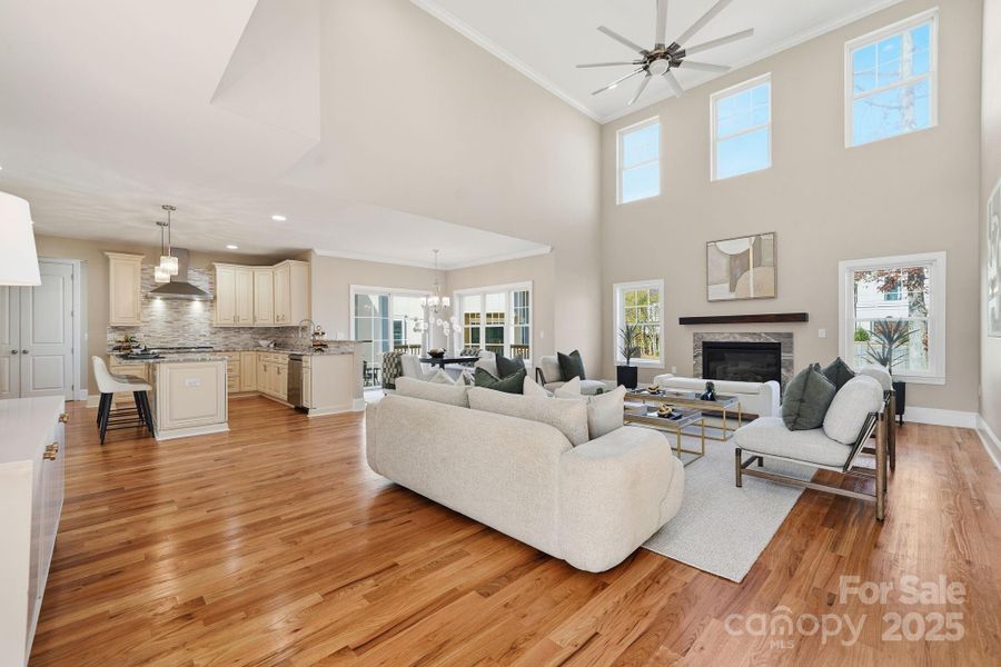 Dining room shown from the foyer — bright, open, and beautifully staged. Dining room shown from the foyer — bright, open, and beautifully staged.
