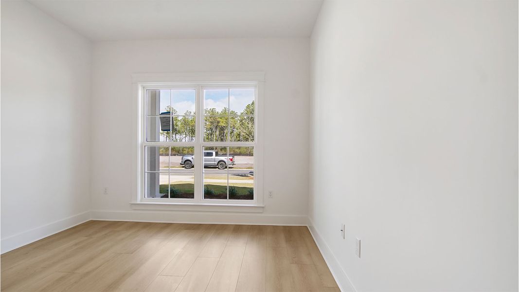 Representative unfurnished interior of a home built from the Magnolia by D.R. Horton in Breakfast Point East Phase II, Panama City Beach (Image 29).