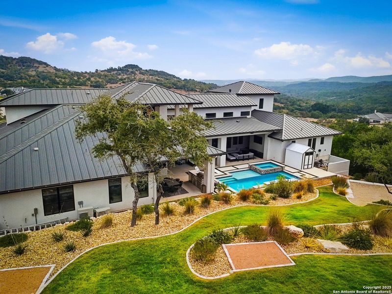 Exterior details and patio area of a home in , San Antonio (Image 54).