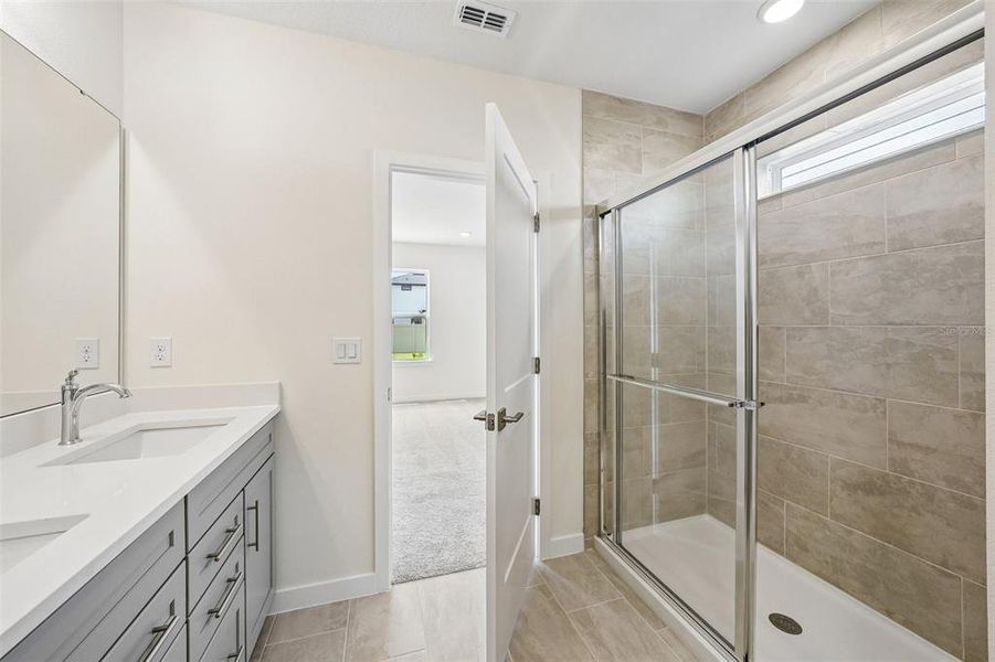 Furnished interior view inside a new home in Grasslands West, Lakeland (Image 5).