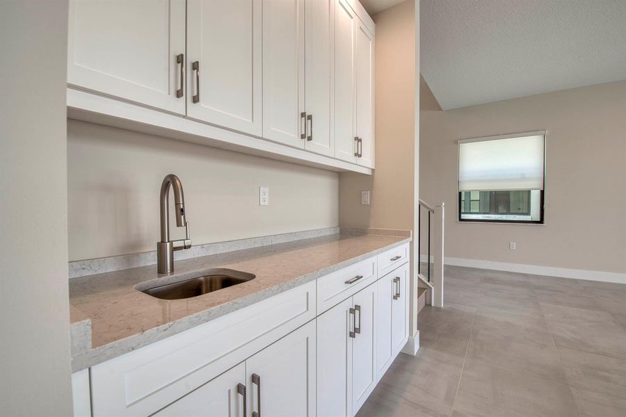 Furnished interior view inside a new home in Apex at Avenir, Palm Beach Gardens (Image 13). Furnished interior view inside a new home in Apex at Avenir, Palm Beach Gardens (Image 13).