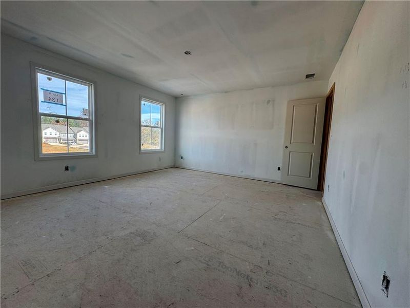 In-progress construction of a new home in Eastlyn Crossing - Single Family, Flowery Branch, GA (Image 5).