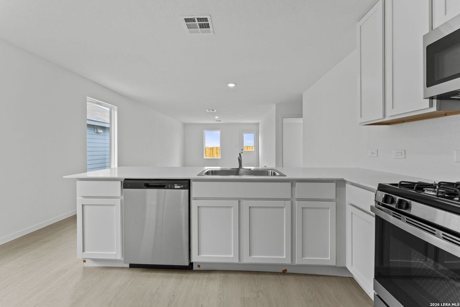 Furnished interior view inside a new home in Spring Grove, San Antonio (Image 8).