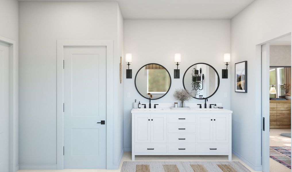 Primary bath with dual sinks and circle mirrors