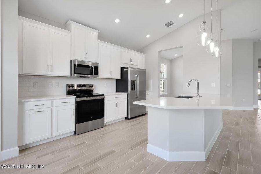 Furnished interior view inside a new home in Colbert Landings, Palm Coast (Image 4).