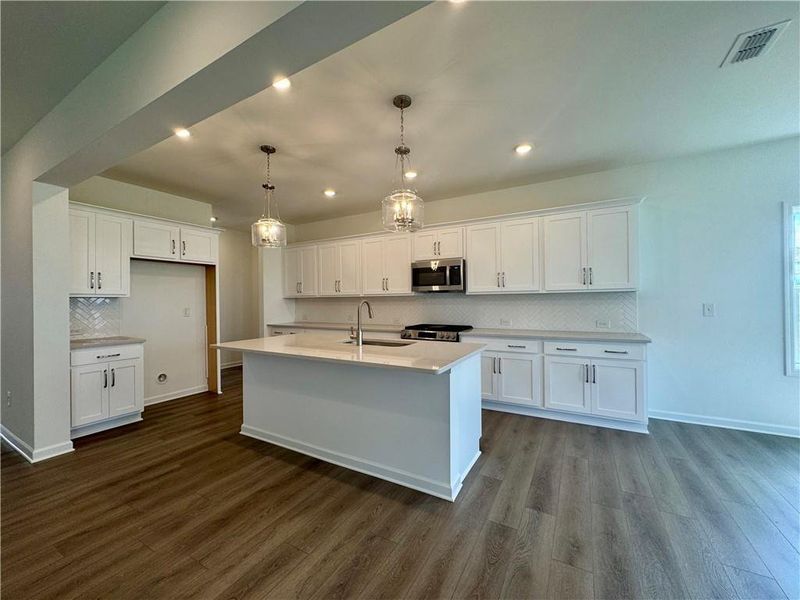 Furnished interior view inside a new home in Eastlyn Crossing - Single Family, Flowery Branch (Image 14). Furnished interior view inside a new home in Eastlyn Crossing - Single Family, Flowery Branch (Image 14).