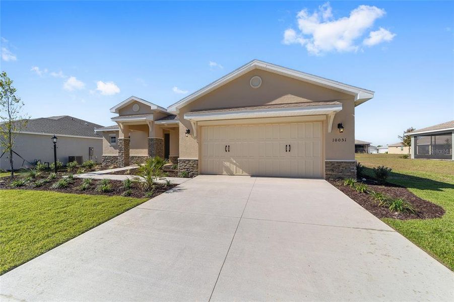 Front exterior of a new home in , Ocala, FL, highlighting curb appeal (Image 22). Front exterior of a new home in , Ocala, FL, highlighting curb appeal (Image 22).