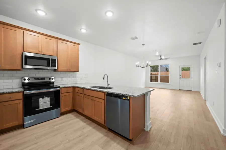 Furnished interior view inside a new home in College Park Townhomes, Troy (Image 4). Furnished interior view inside a new home in College Park Townhomes, Troy (Image 4).