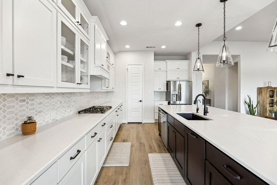 Kitchen with white cabinetry