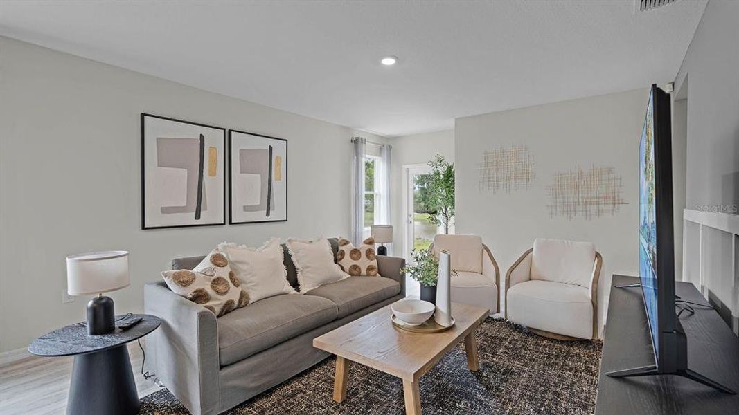 Furnished interior view inside a new home in Lake Deer Estates, Poinciana (Image 4).