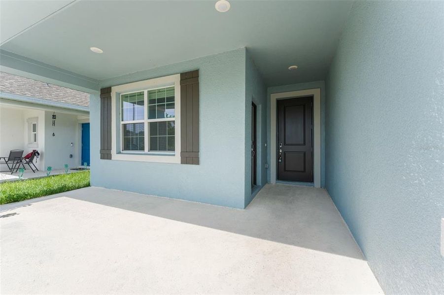 Exterior details and patio area of a home in Peace Creek Reserve, Winter Haven (Image 3).