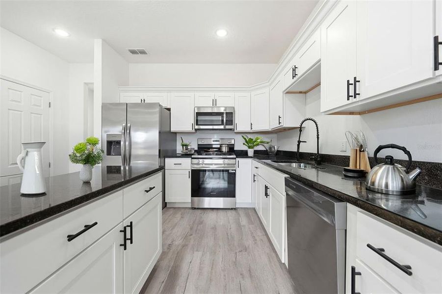 Furnished interior view inside a new home in , Haines City (Image 11).