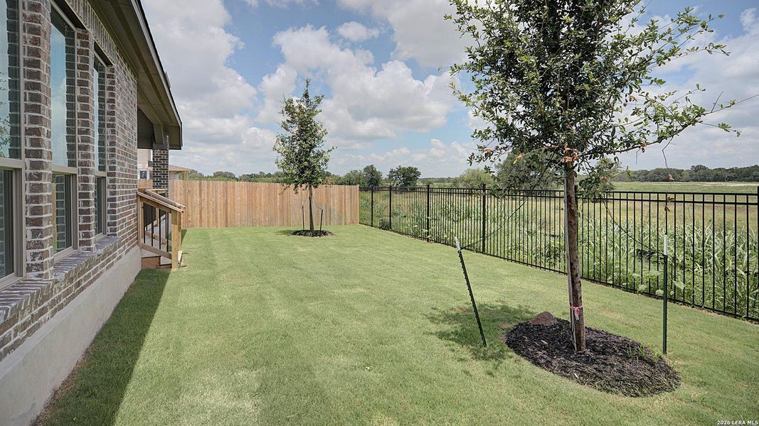 Exterior details and patio area of a home in Alsatian Oaks, Castroville (Image 4).