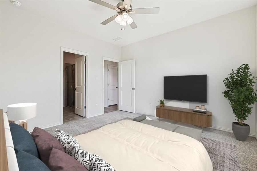 Carpeted bedroom with baseboards and a ceiling fan Carpeted bedroom with baseboards and a ceiling fan