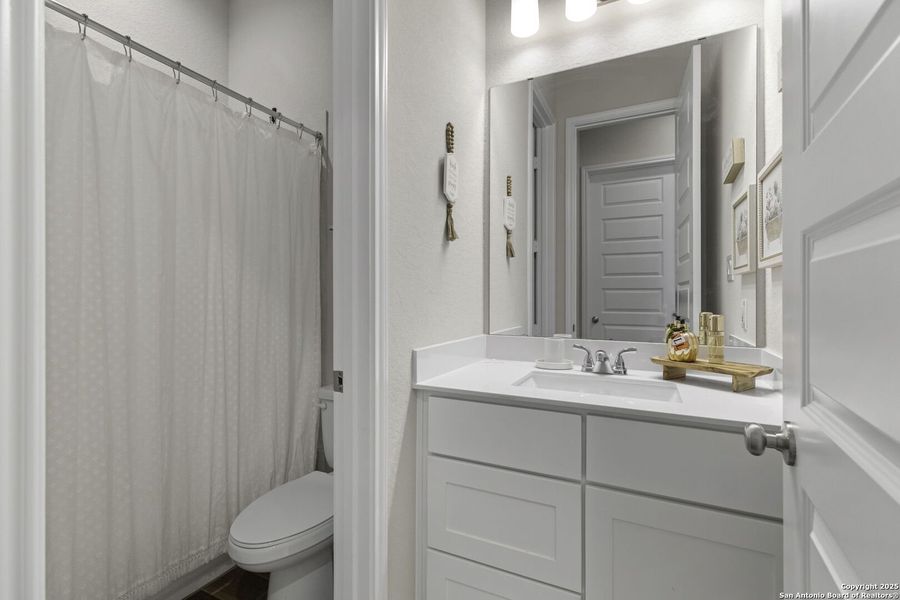 Furnished interior view inside a new home in The Village of Mill Creek 50', Seguin (Image 15).