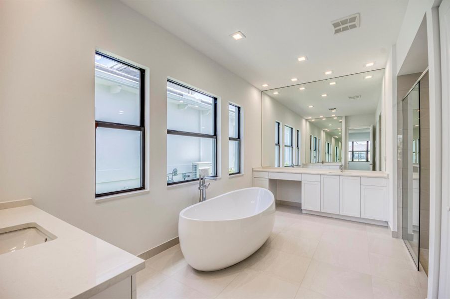 Furnished interior view inside a new home in Apex at Avenir, Palm Beach Gardens (Image 9). Furnished interior view inside a new home in Apex at Avenir, Palm Beach Gardens (Image 9).